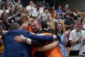 A picture of ESN volunteers hugging during the General Assembly